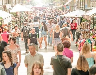 People Walking Past Vendors